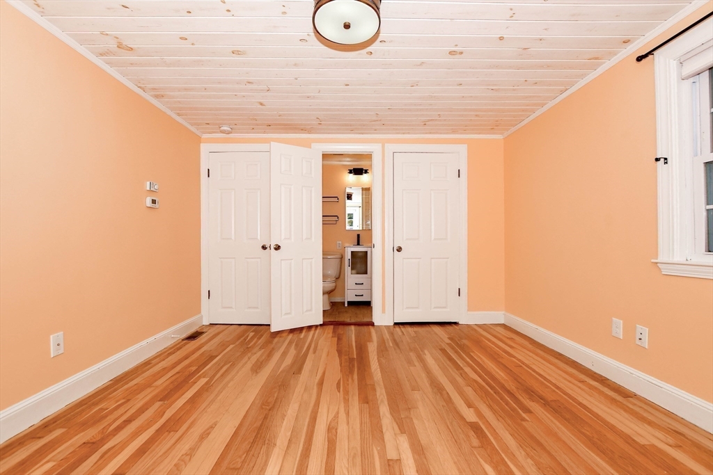 1251 Broadway Hanover, MA 02339 - Photo 24 of 39 a view of a room with wooden floor and white walls