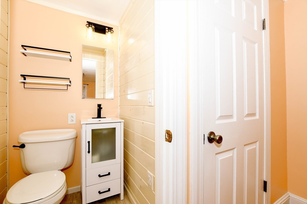 1251 Broadway Hanover, MA 02339 - Photo 26 of 39 a bathroom with a toilet sink and shower