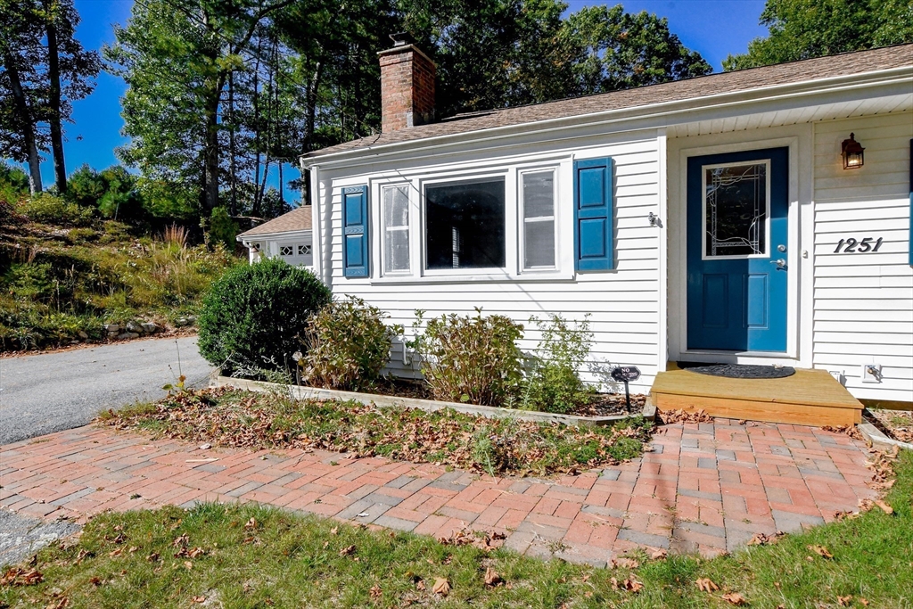 1251 Broadway Hanover, MA 02339 - Photo 3 of 39 a front view of a house with a yard