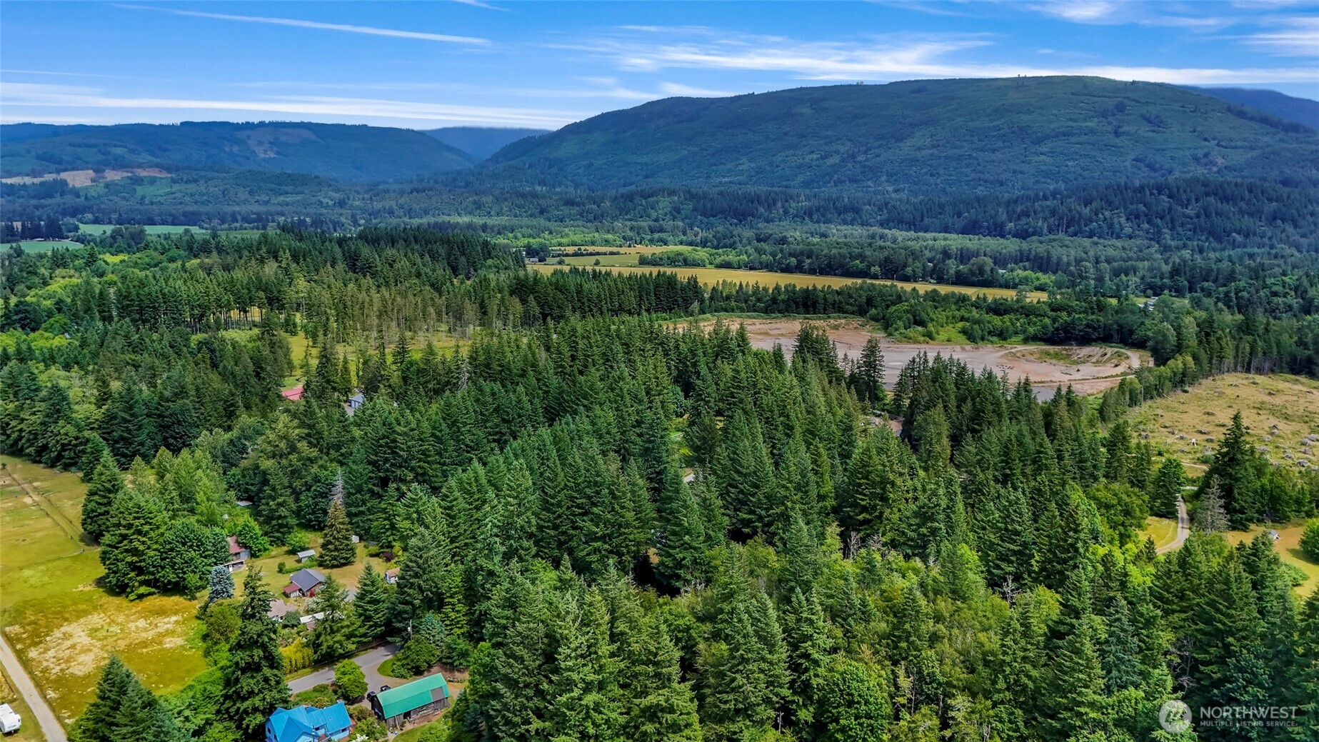 5650 Doran Road Acme, WA 98220 - Photo 11 of 40 a view of a lake with a yard