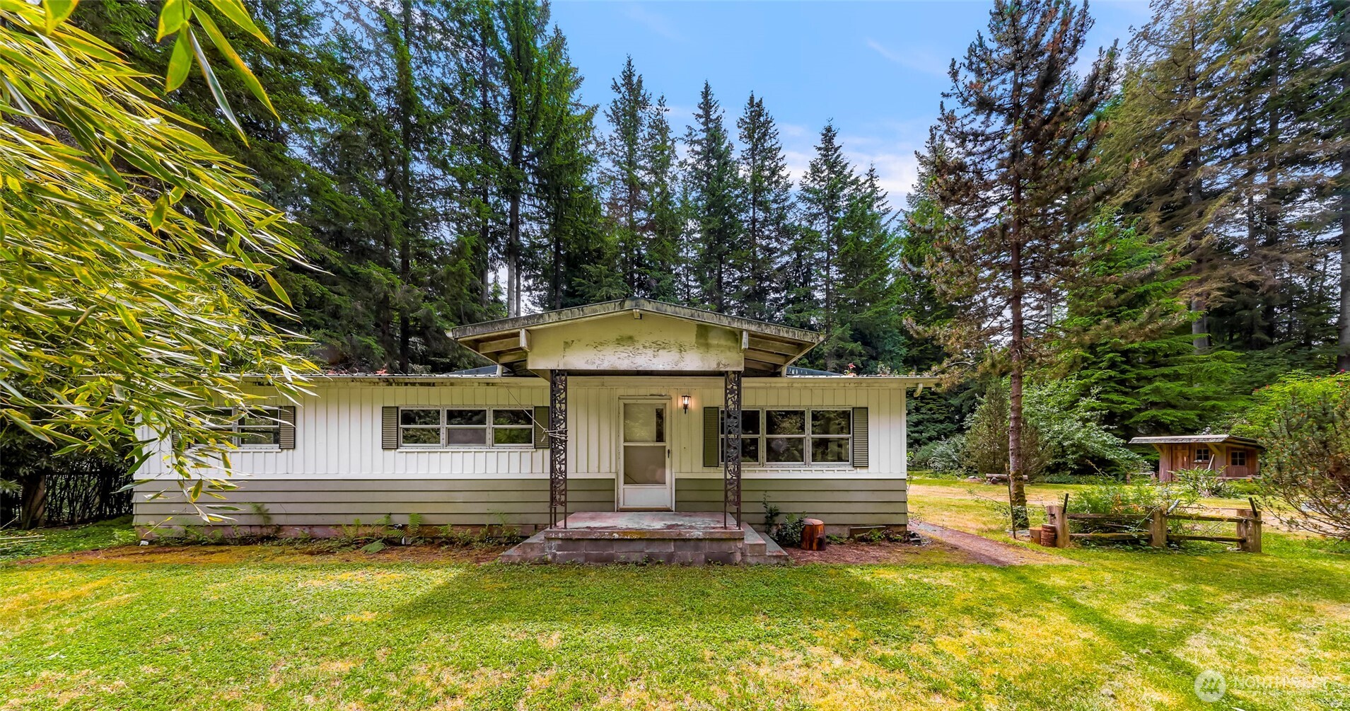 5650 Doran Road Acme, WA 98220 - Photo 14 of 40 a view of a house with a yard patio and a tree