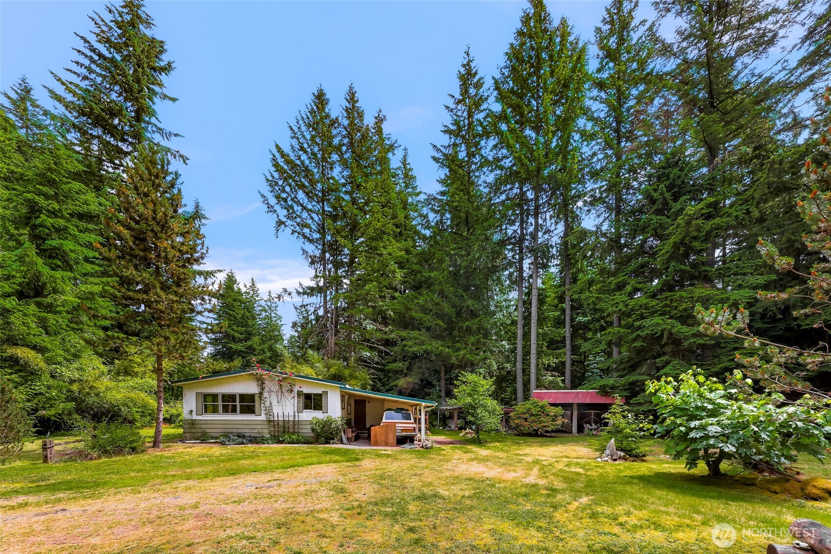 5650 Doran Road Acme, WA 98220 - Photo 15 of 40 a house view with swimming pool in front of it