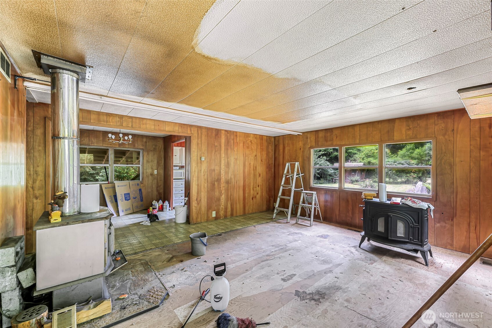 5650 Doran Road Acme, WA 98220 - Photo 17 of 40 a living room with furniture and large windows