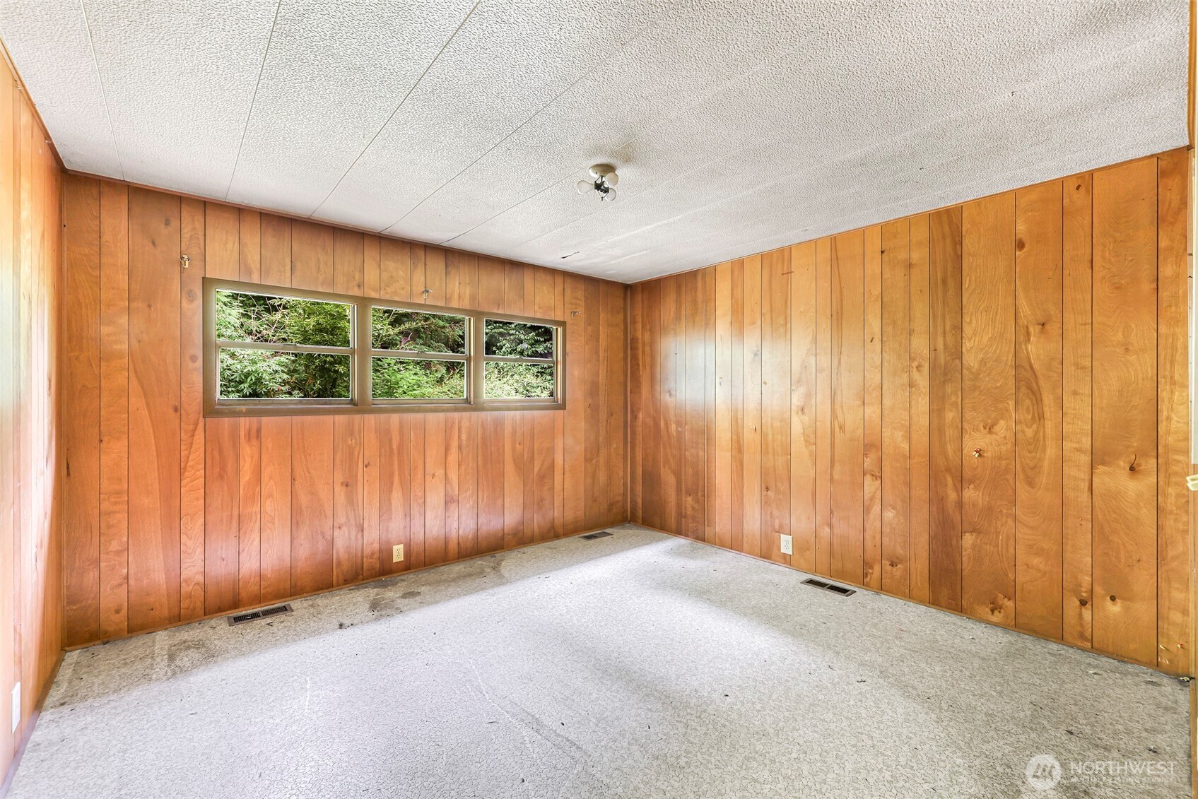 5650 Doran Road Acme, WA 98220 - Photo 19 of 40 an empty room with a window and a curtain