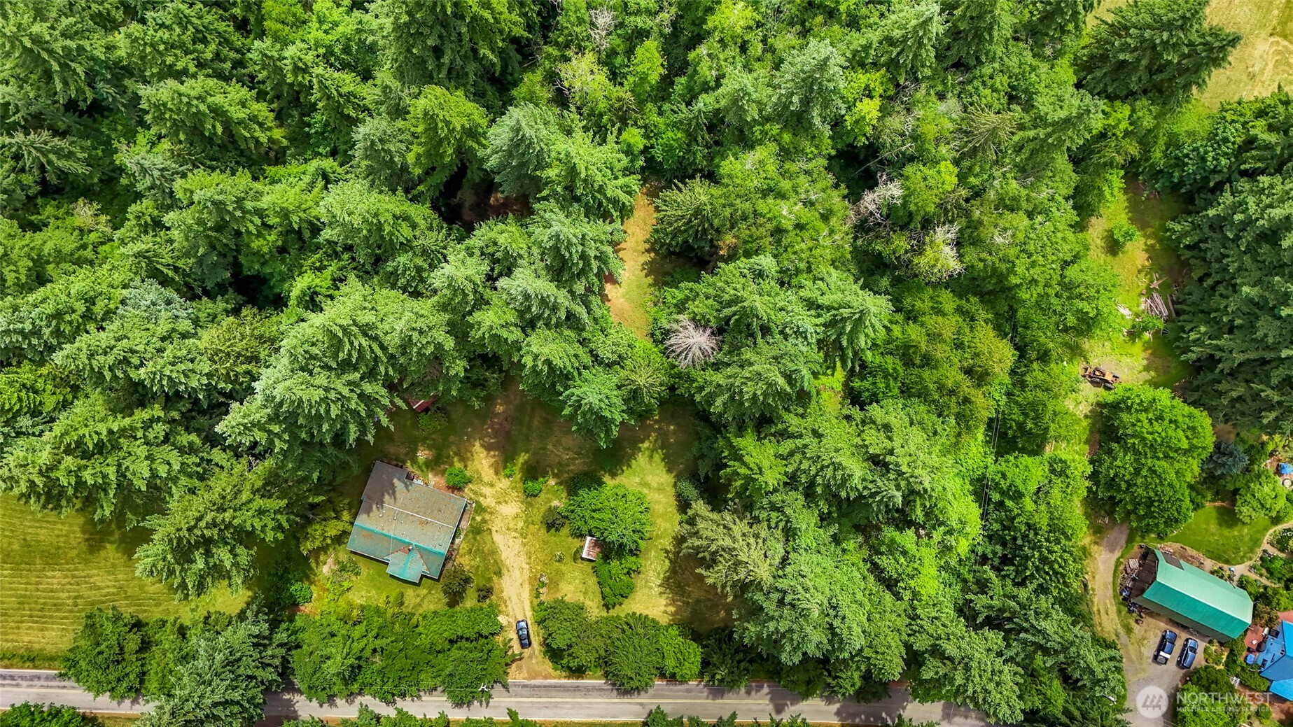 5650 Doran Road Acme, WA 98220 - Photo 2 of 40 an aerial view of residential houses with trees