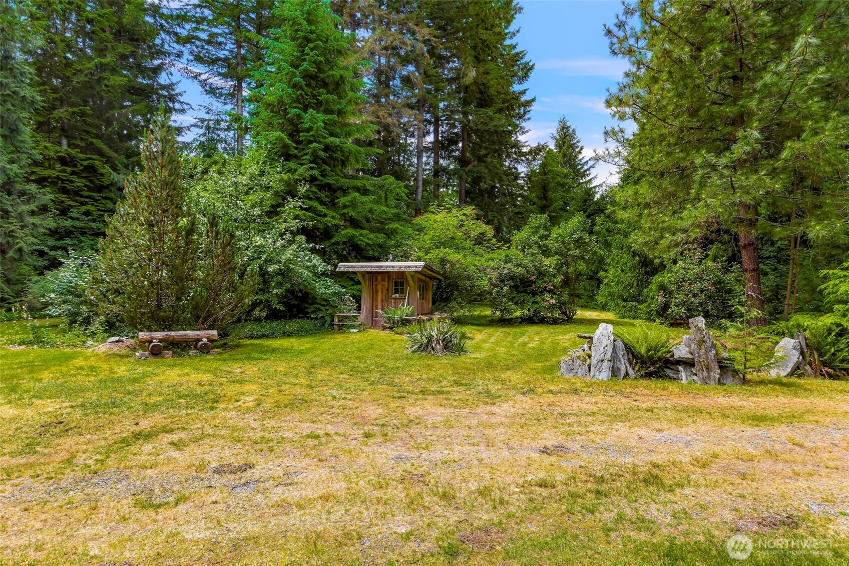 5650 Doran Road Acme, WA 98220 - Photo 26 of 40 a swimming pool with trees in the background