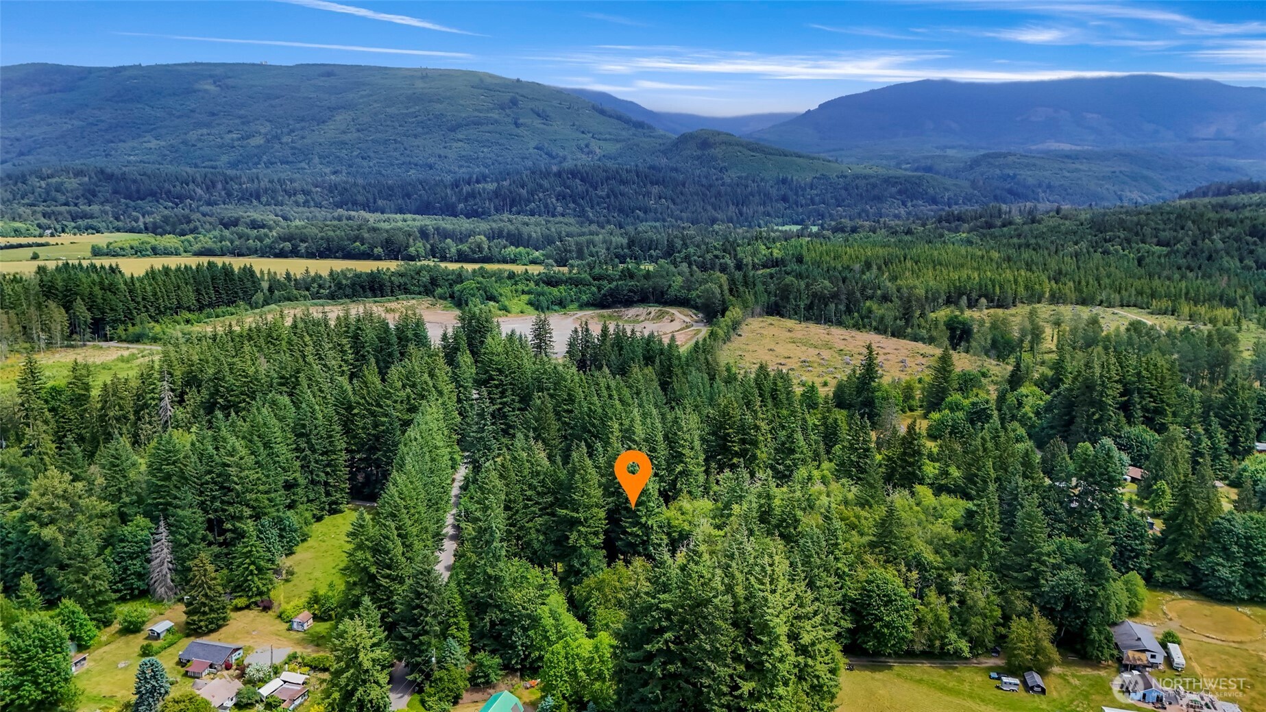 5650 Doran Road Acme, WA 98220 - Photo 40 of 40 a aerial view of a house with a lake view