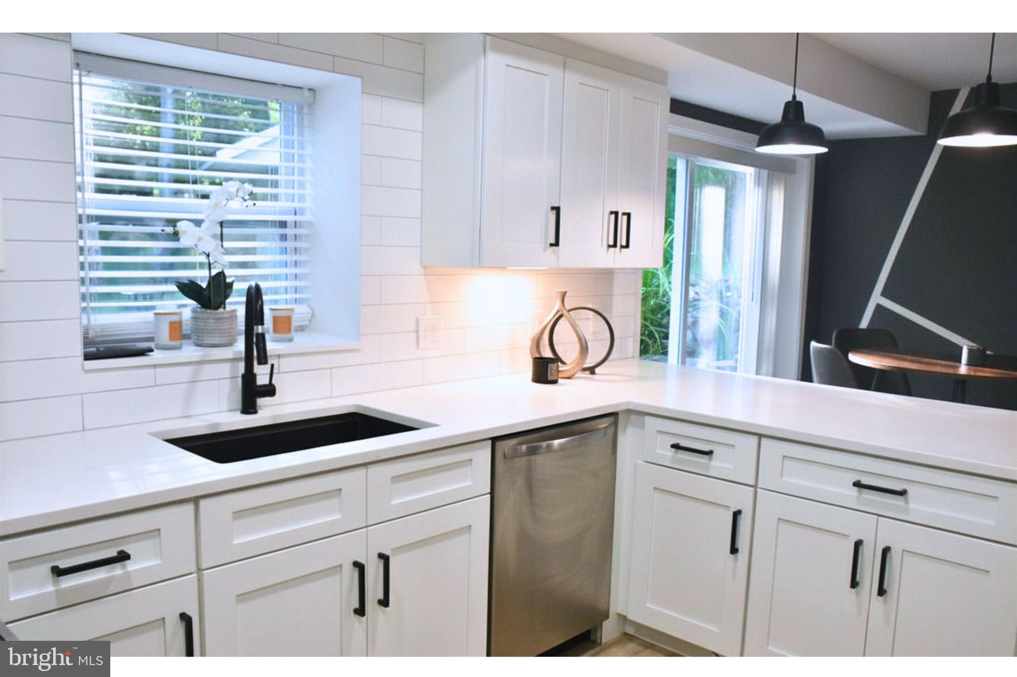 17930 Masemore Road Parkton, MD 21120 - Photo 10 of 46 a kitchen with a sink and cabinets