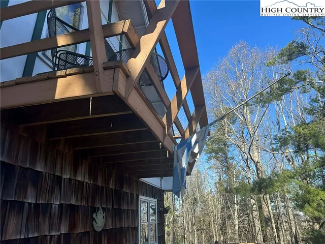 a view of a livingroom with furniture and window
