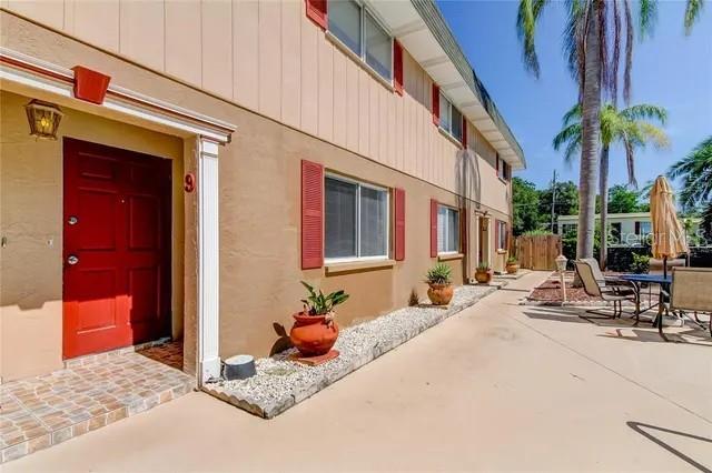300 6th Street North, Unit W2 Safety Harbor, FL 34695 - Photo 1 of 22 a view of a building with sitting area
