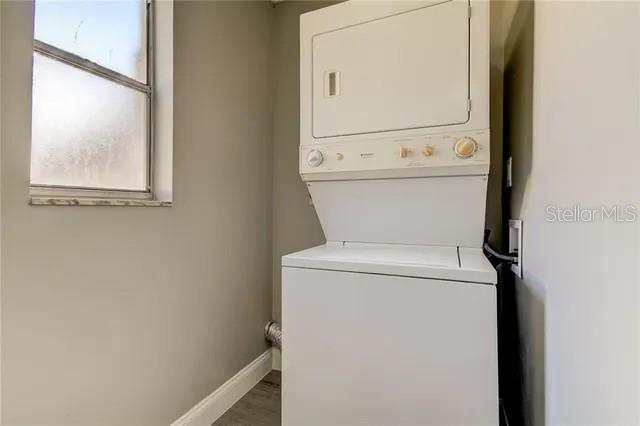 300 6th Street North, Unit W2 Safety Harbor, FL 34695 - Photo 13 of 22 a utility room with dryer and washer