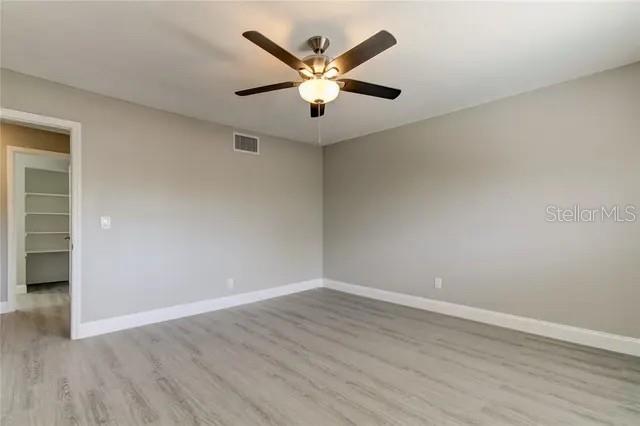 300 6th Street North, Unit W2 Safety Harbor, FL 34695 - Photo 21 of 22 an view of an empty room with wooden floor