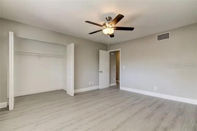 300 6th Street North, Unit W2 Safety Harbor, FL 34695 - Photo 22 of 22 a view of an empty room with wooden floor