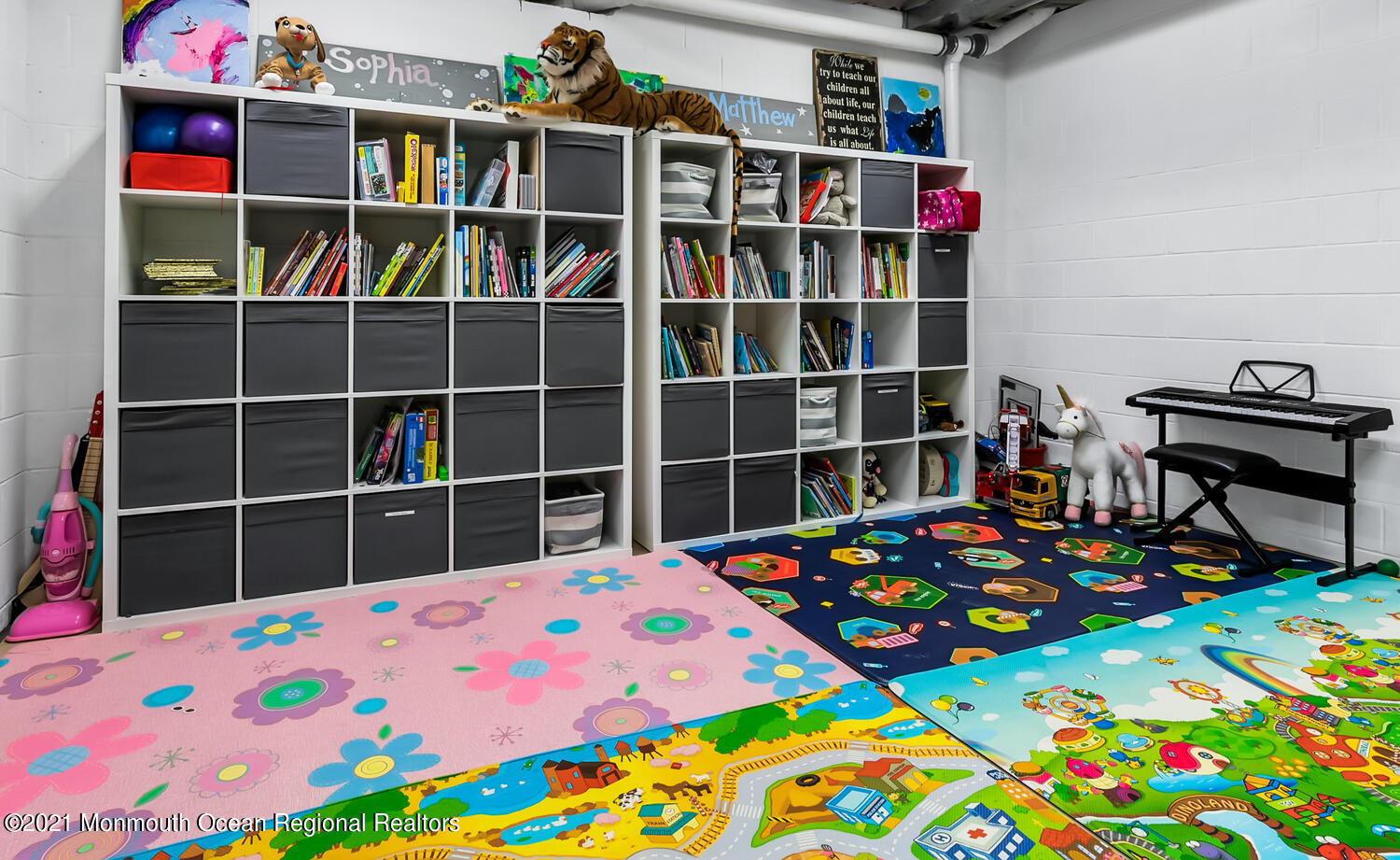 7 Sheraton Lane Rumson, NJ 07760 - Photo 26 of 32 a room that has a bed and a bookshelf in it