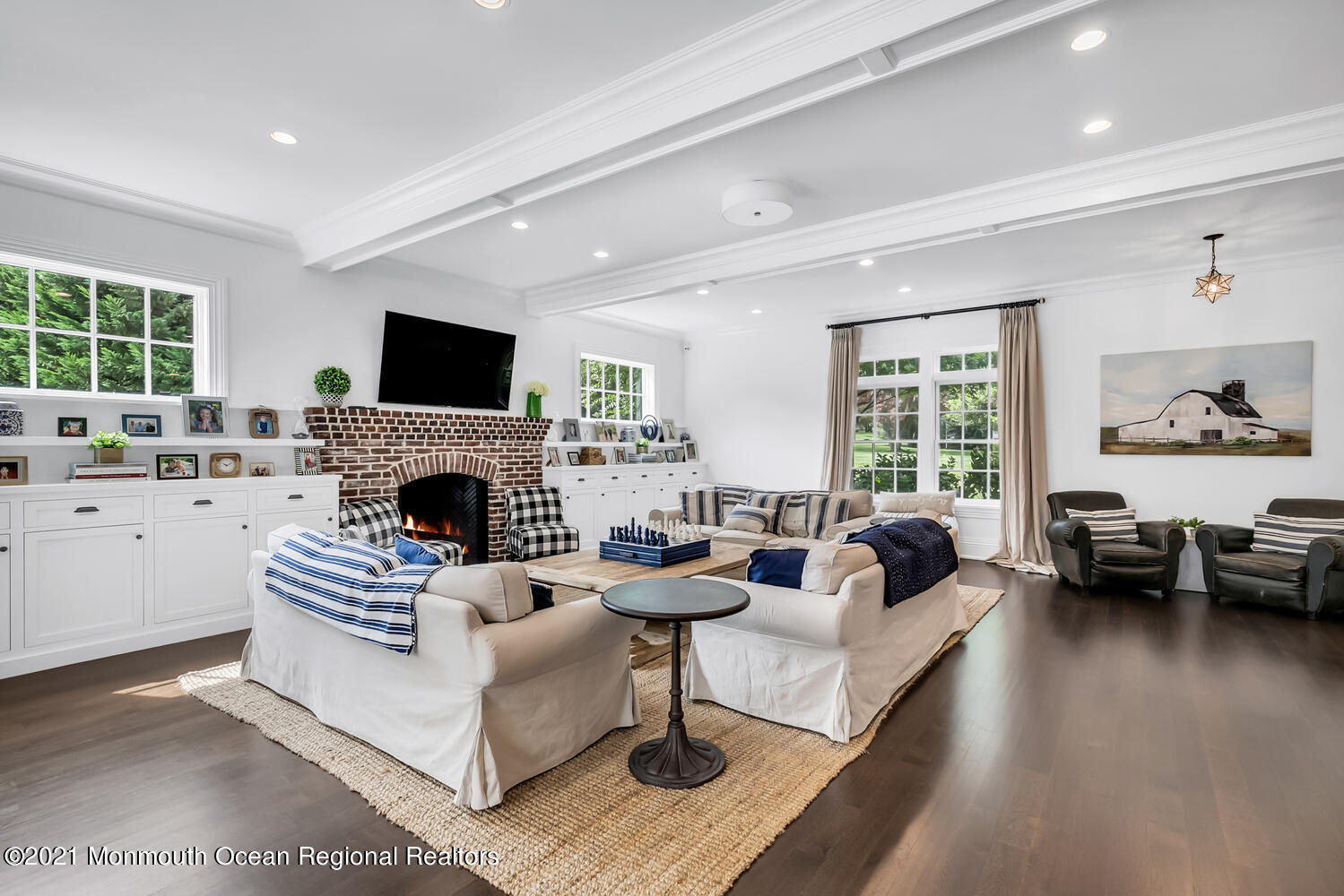 7 Sheraton Lane Rumson, NJ 07760 - Photo 5 of 32 a living room with furniture a fireplace and a flat screen tv