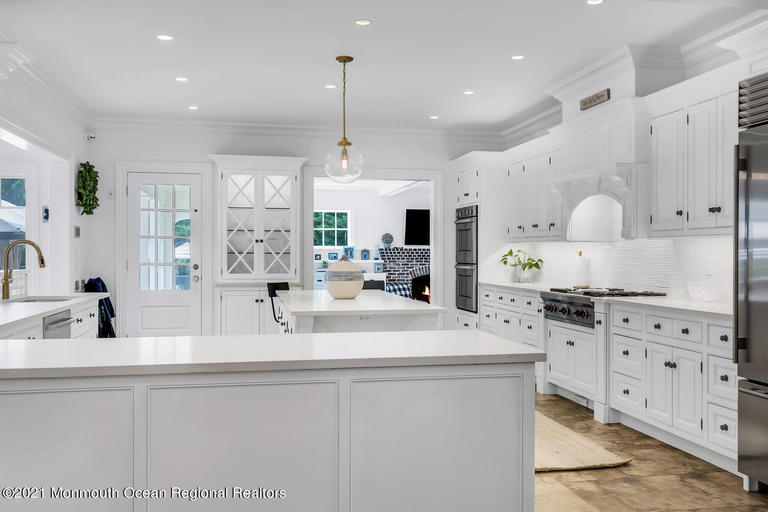 7 Sheraton Lane Rumson, NJ 07760 - Photo 7 of 32 a kitchen with stainless steel appliances kitchen island granite countertop a sink a stove and cabinets