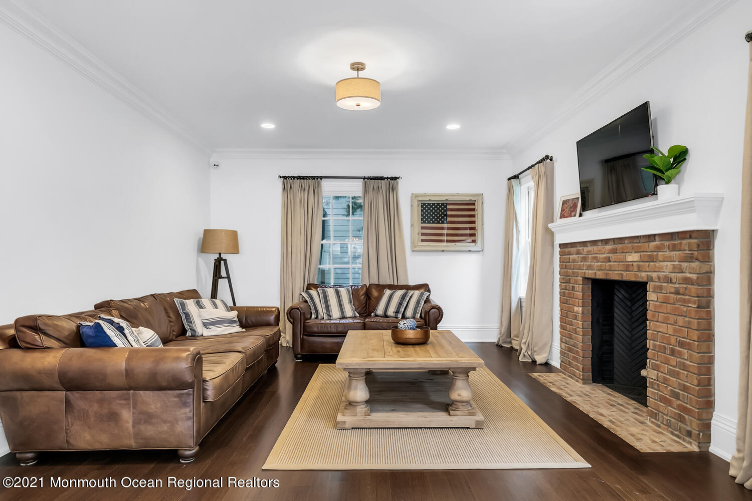 7 Sheraton Lane Rumson, NJ 07760 - Photo 9 of 32 a living room with furniture and a fireplace