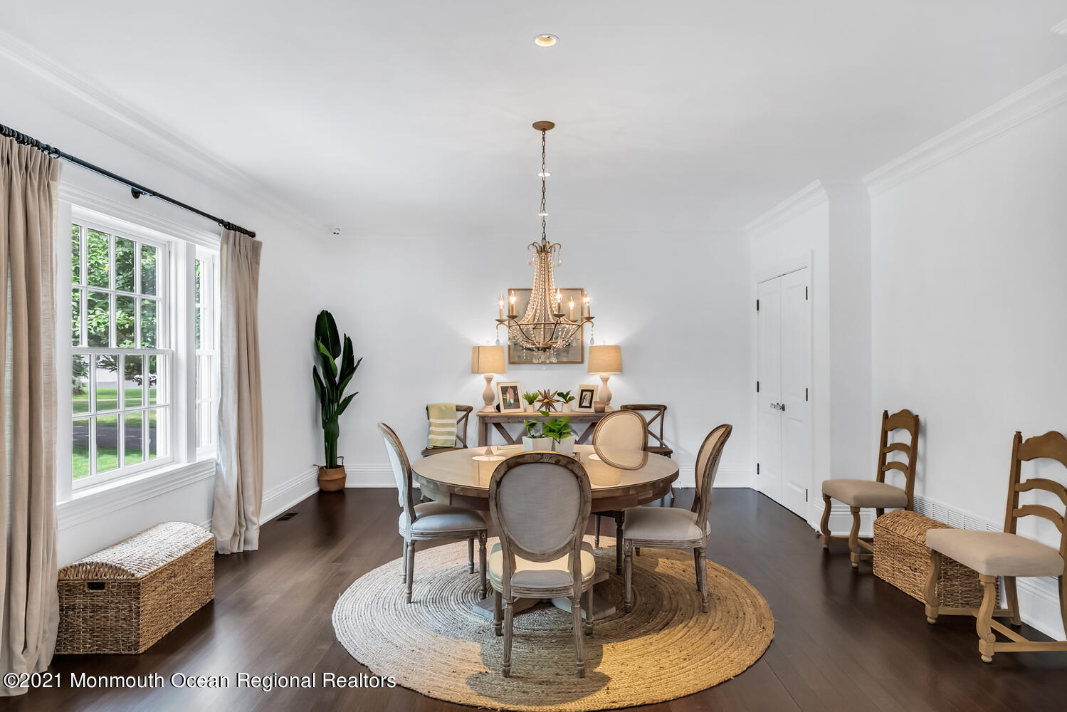7 Sheraton Lane Rumson, NJ 07760 - Photo 10 of 32 a dining room with furniture a chandelier and wooden floor