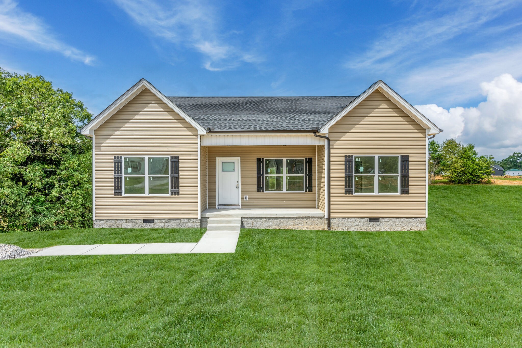 1282 Oak Grove Road Dickson, TN 37055 - Photo 1 of 29 a house that is sitting in the grass