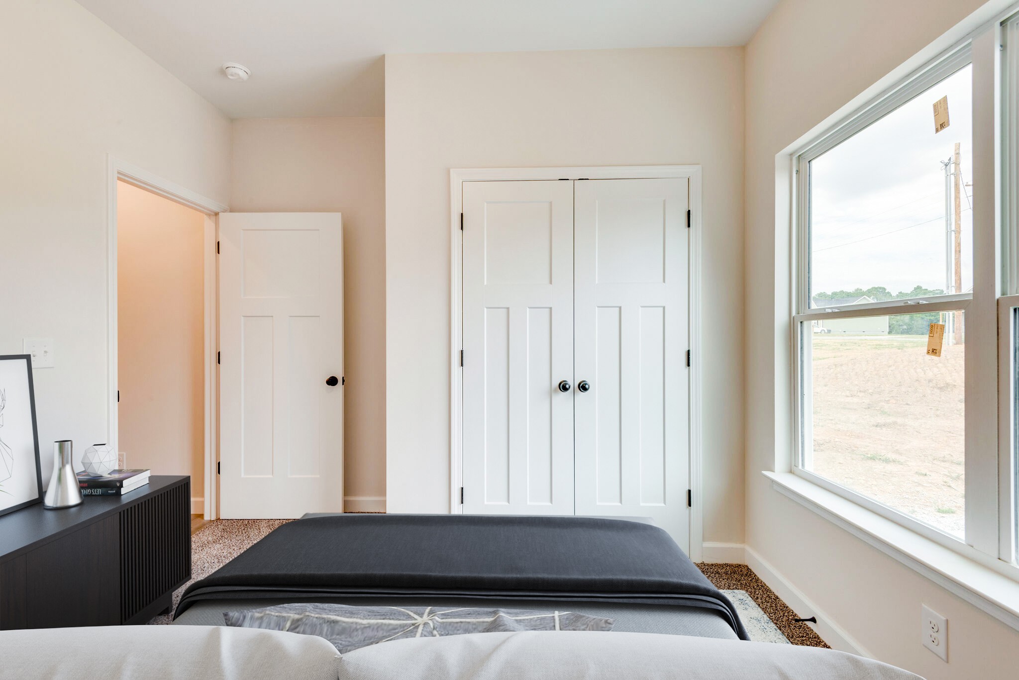 1282 Oak Grove Road Dickson, TN 37055 - Photo 21 of 29 a view of a bedroom with wooden floor and windows