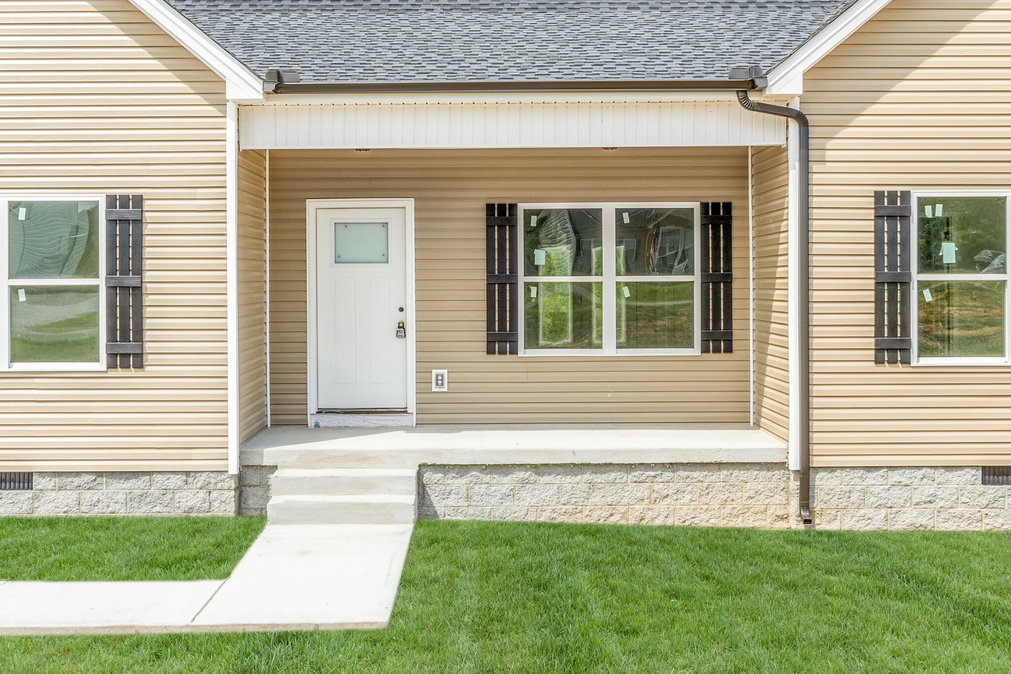 1282 Oak Grove Road Dickson, TN 37055 - Photo 3 of 29 a front view of a house with a yard