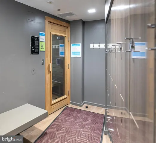 a room with furniture pool table and window