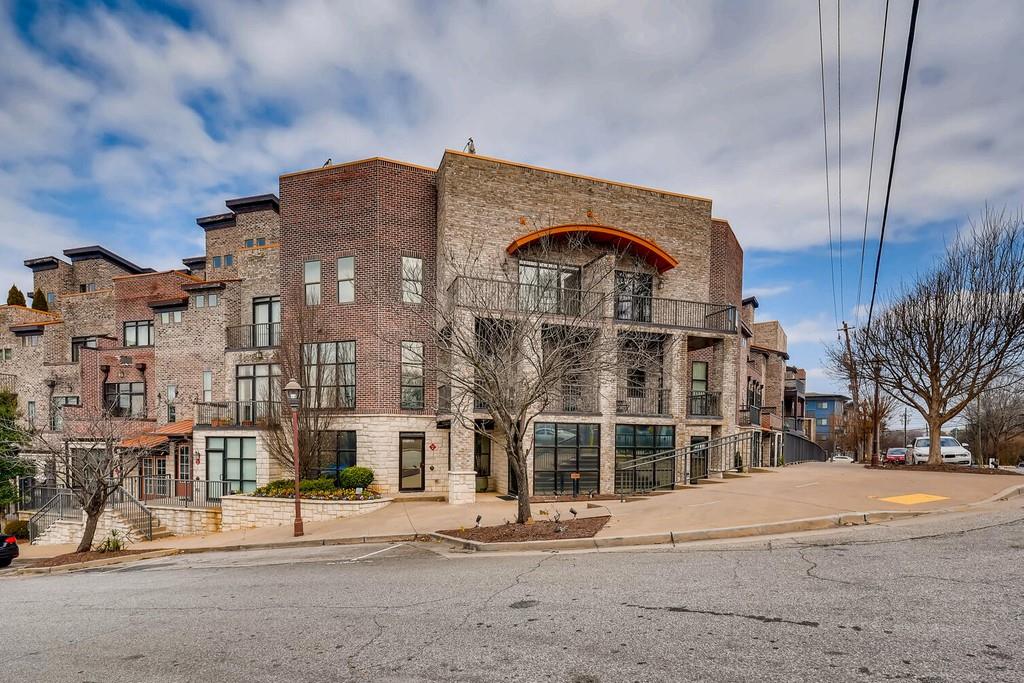 1199 Huff Road Northwest, Unit 115 Atlanta, GA 30318 - Photo 1 of 1 a view of a large building