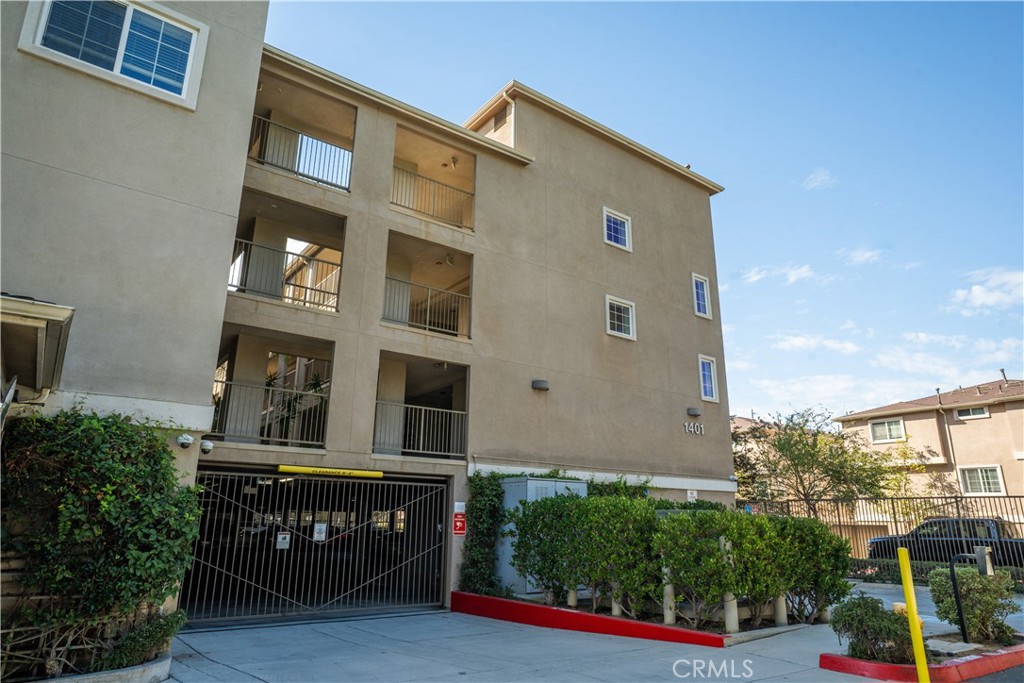 1401 Lomita Boulevard, Unit 302 Harbor City, CA 90710 - Photo 26 of 29 a front view of a building with street