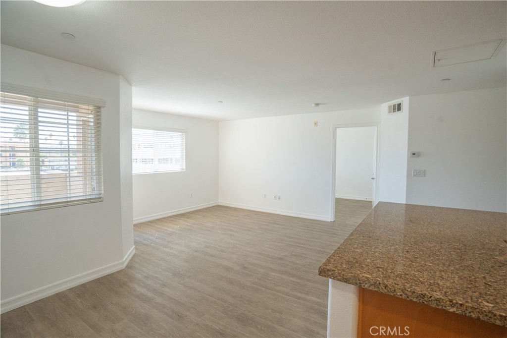 1401 Lomita Boulevard, Unit 302 Harbor City, CA 90710 - Photo 8 of 29 an empty room with windows