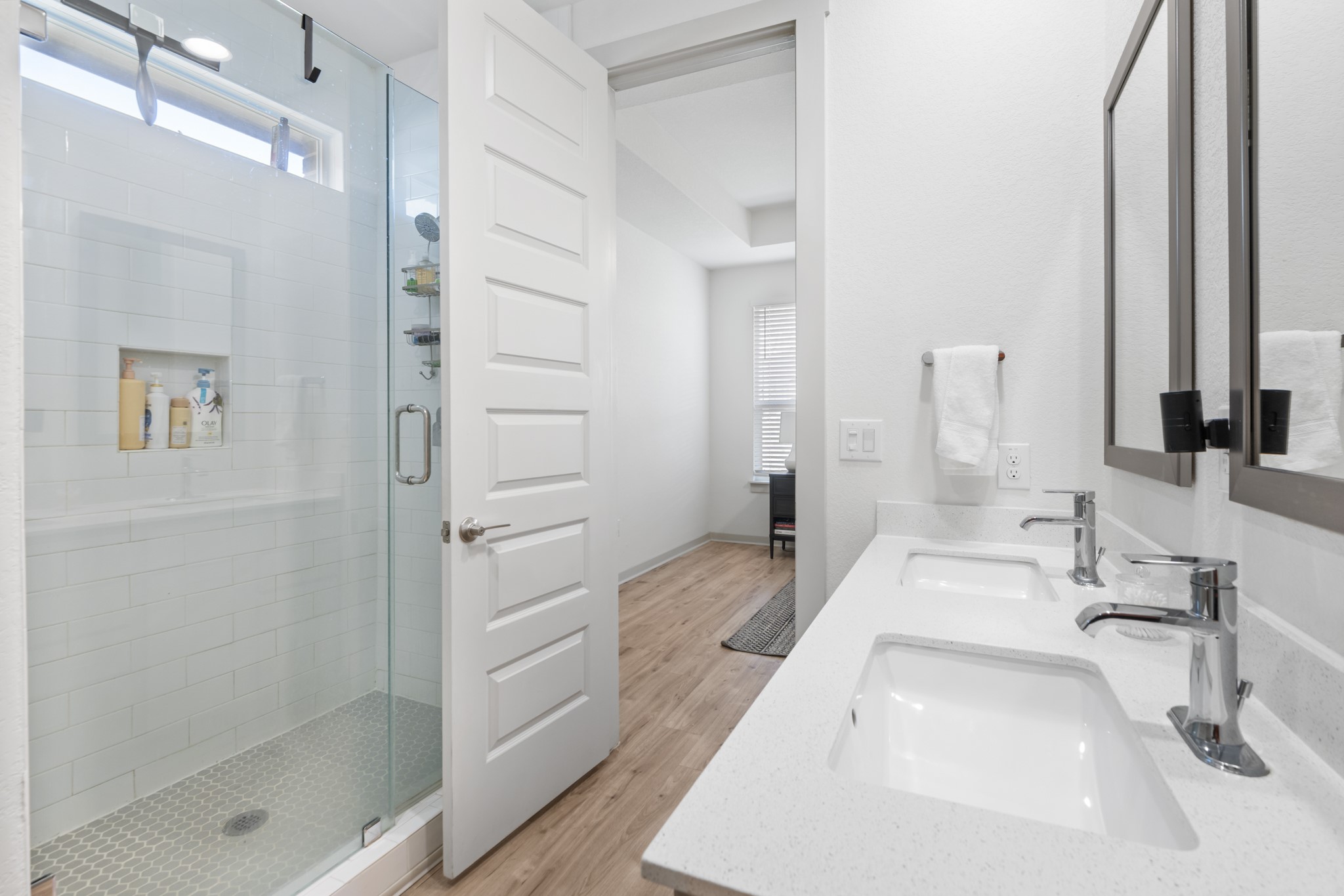 620 Peace Pipe Way Georgetown, TX 78628 - Photo 16 of 32 a bathroom with a sink and a mirror with bathtub
