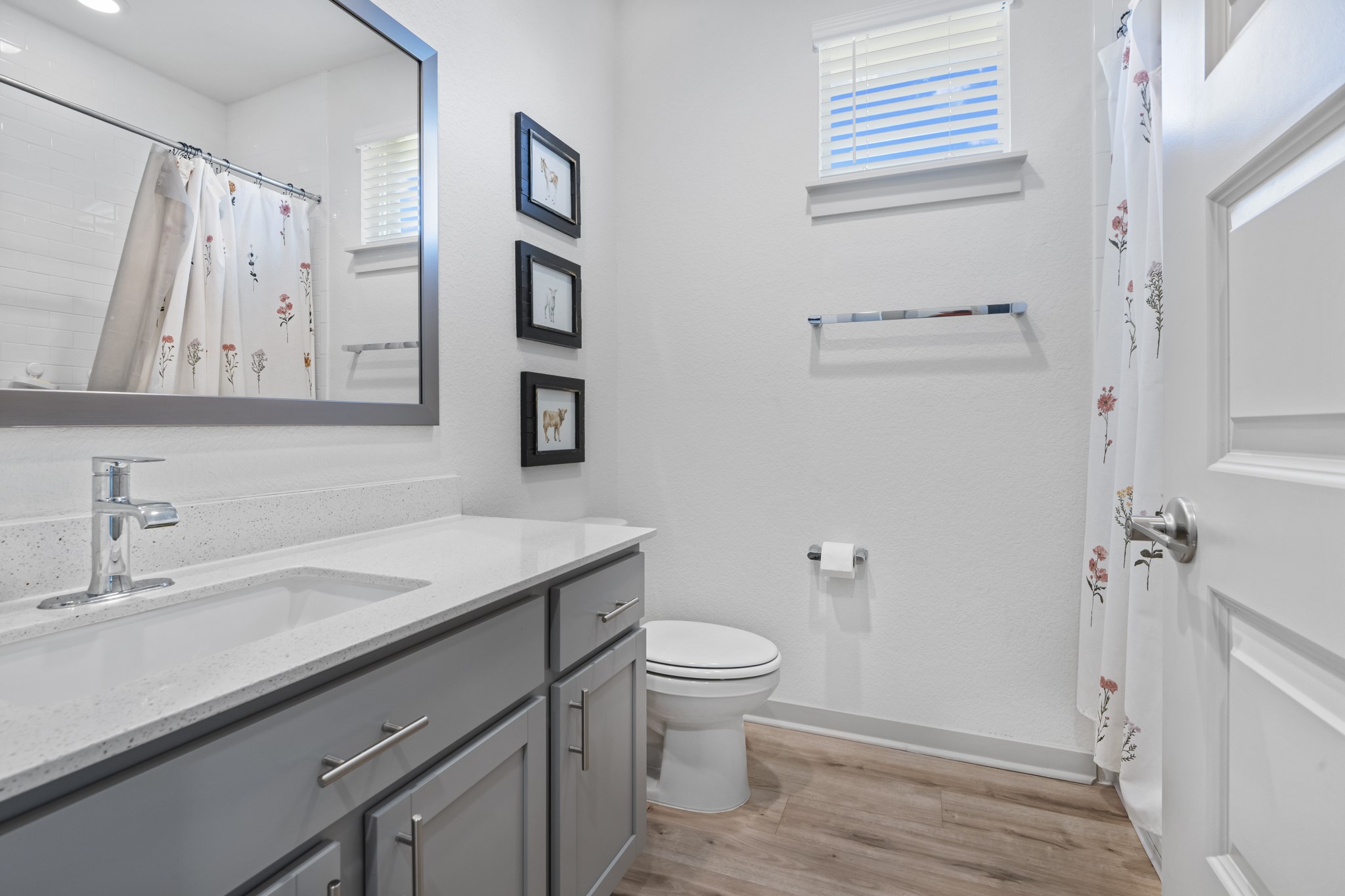 620 Peace Pipe Way Georgetown, TX 78628 - Photo 18 of 32 a bathroom with a sink a toilet and shower