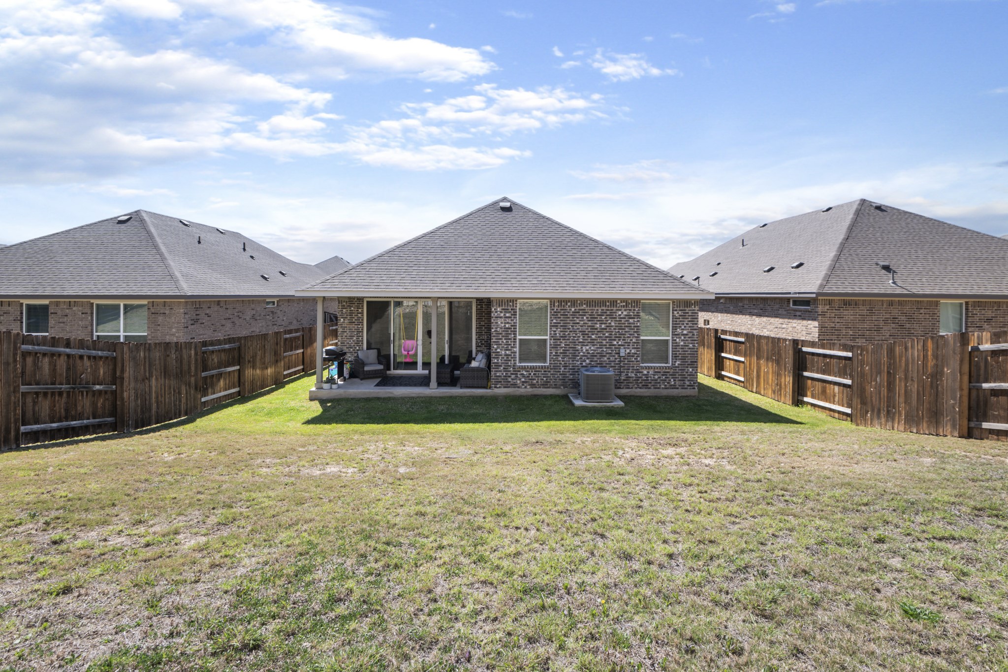 620 Peace Pipe Way Georgetown, TX 78628 - Photo 30 of 32 a house with swimming pool in front of it