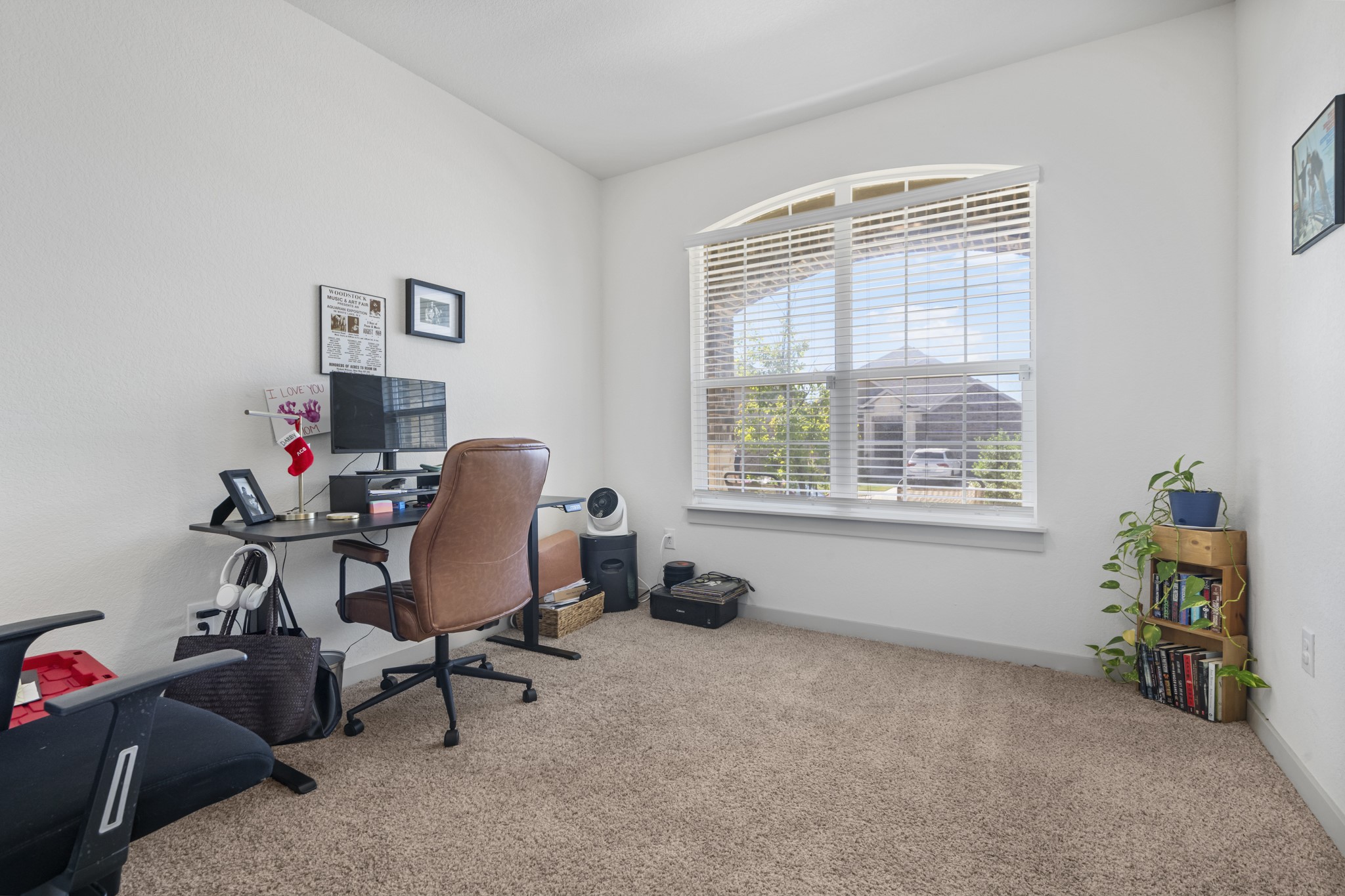620 Peace Pipe Way Georgetown, TX 78628 - Photo 5 of 32 a view of a workspace with a window