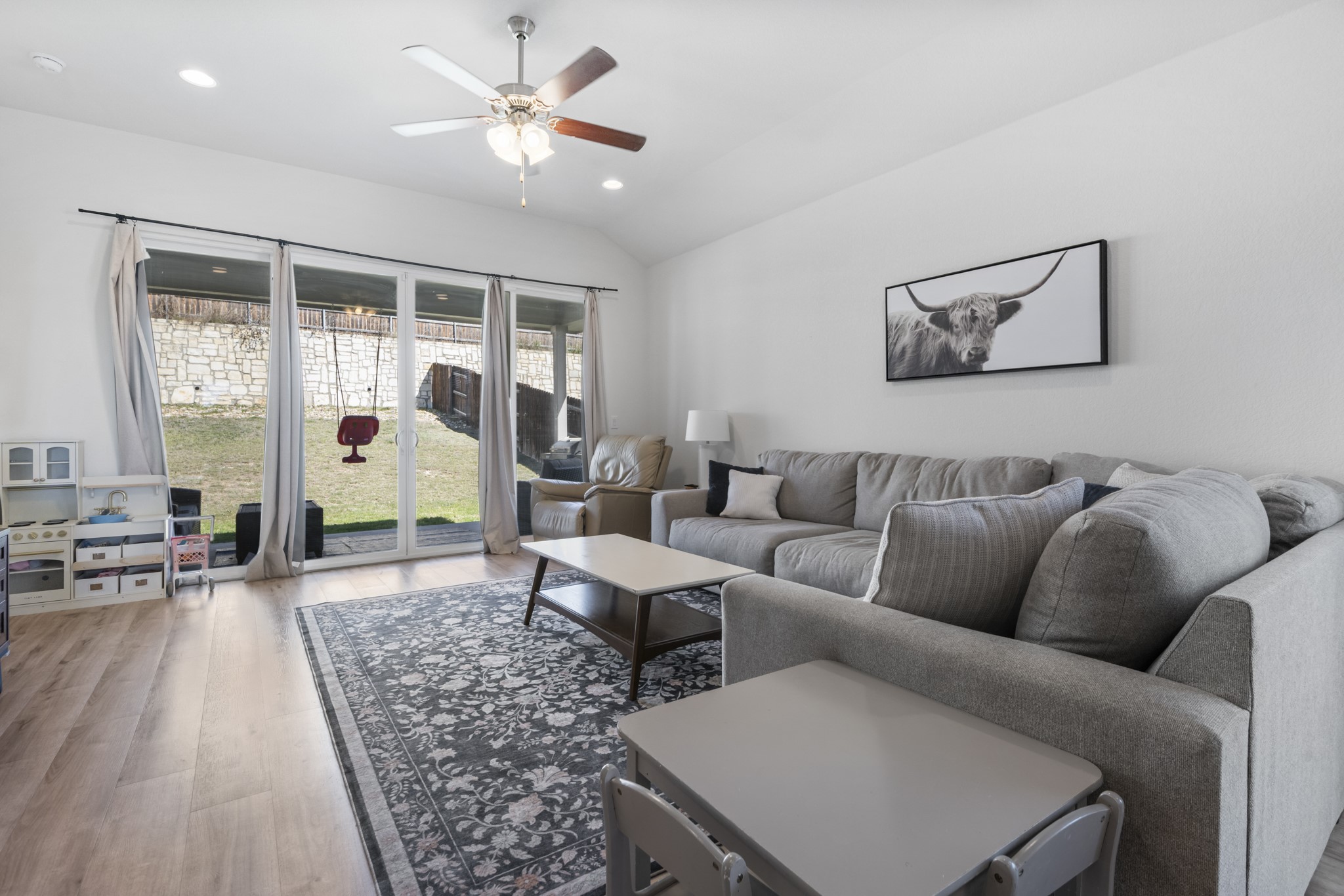 620 Peace Pipe Way Georgetown, TX 78628 - Photo 10 of 32 a living room with furniture and a large window