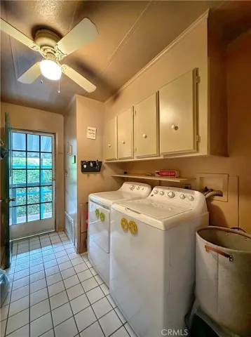 a utility room with washer and dryer