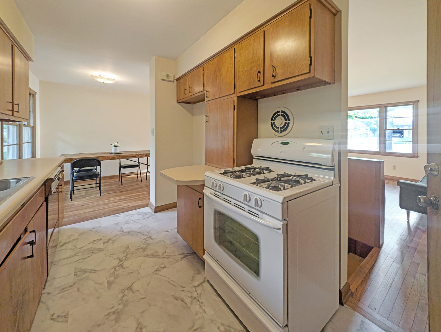 1 Gary Court Normal, IL 61761 - Photo 11 of 29 a kitchen with cabinets and a stove top oven