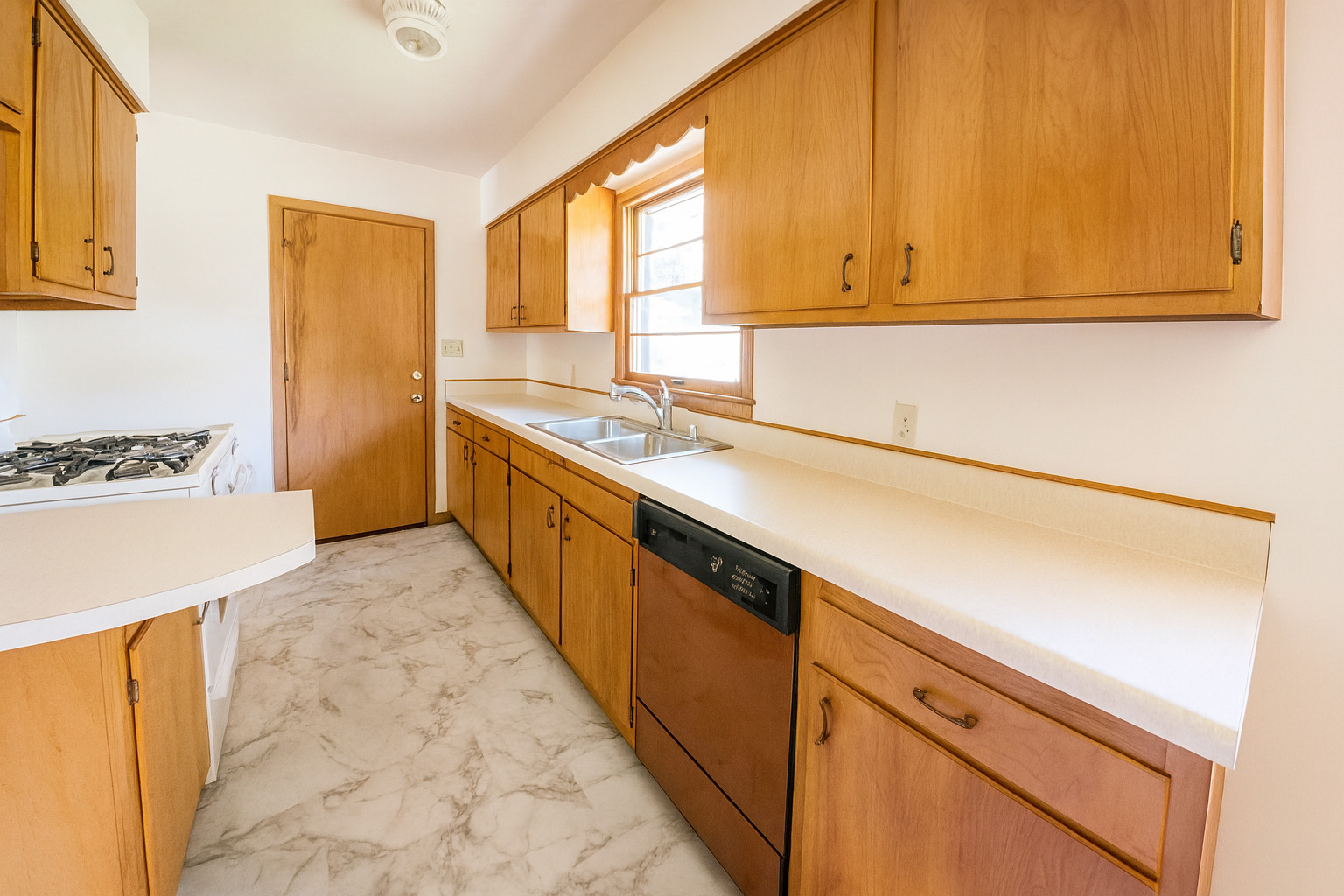 1 Gary Court Normal, IL 61761 - Photo 12 of 29 a kitchen with stainless steel appliances granite countertop a sink stove and cabinets