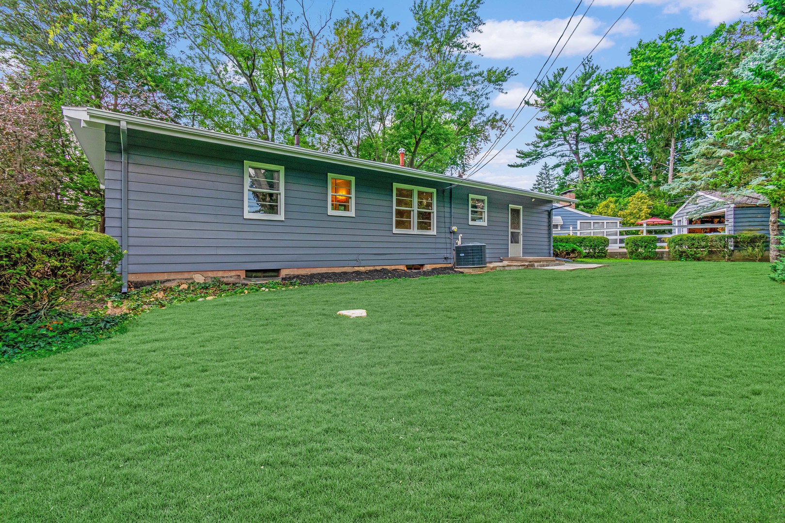 1 Gary Court Normal, IL 61761 - Photo 2 of 29 a backyard of a house with table and chairs