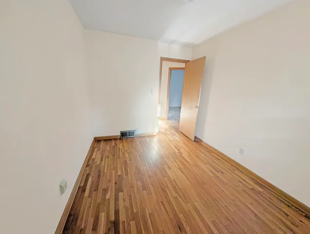 a view of livingroom with furniture and wooden floor