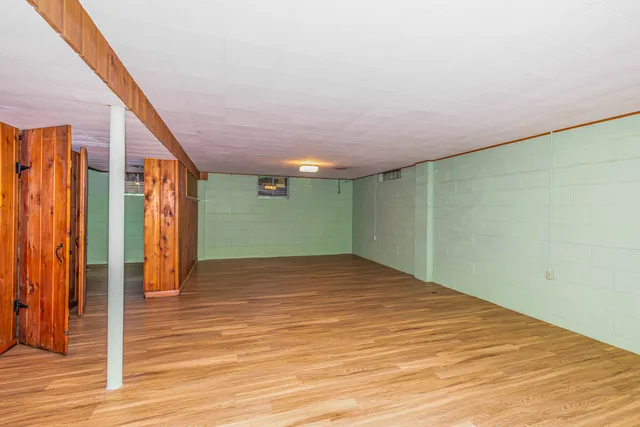 a view of a workspace with furniture