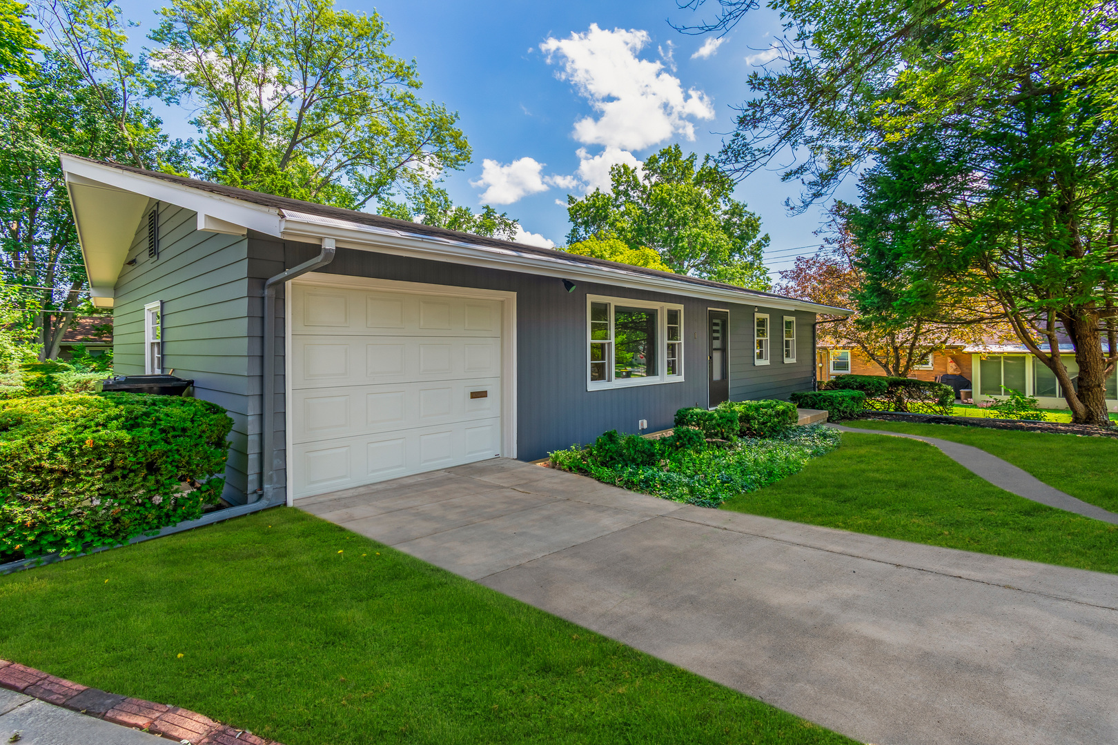 1 Gary Court Normal, IL 61761 - Photo 28 of 29 a backyard of a house with plants and large tree