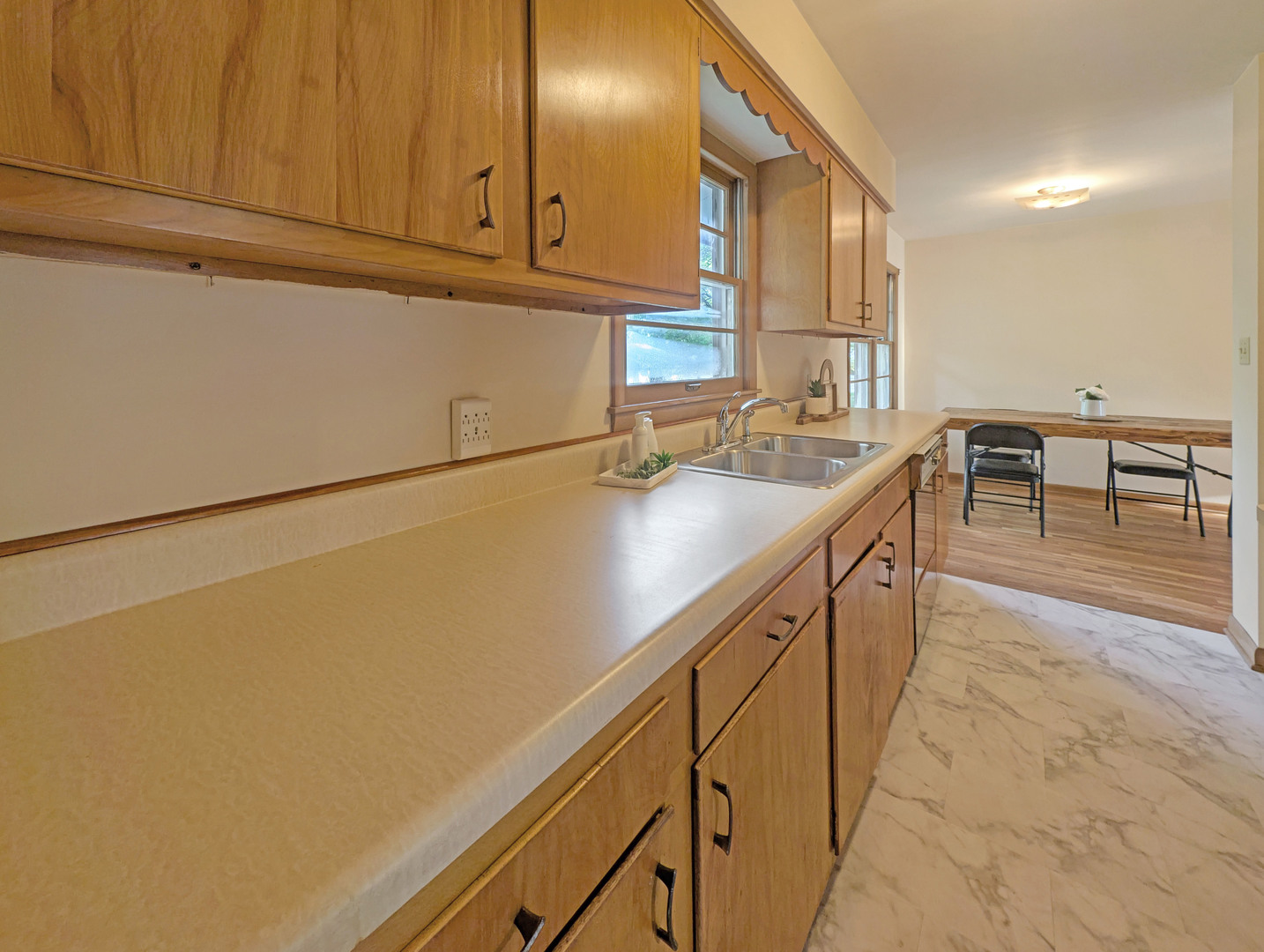 1 Gary Court Normal, IL 61761 - Photo 10 of 29 a kitchen with appliances a sink and cabinets
