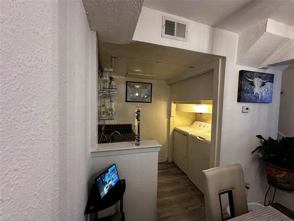 4272 Madera Road, Unit 4 Irving, TX 75038 - Photo 10 of 32 a living room with furniture and a flat screen tv