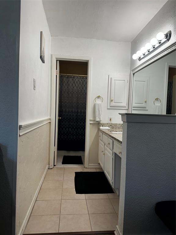 4272 Madera Road, Unit 4 Irving, TX 75038 - Photo 16 of 32 a kitchen with a sink and a stove top oven