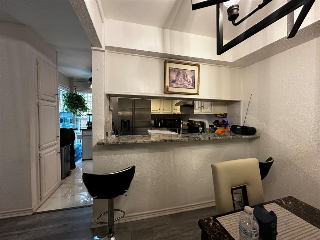 4272 Madera Road, Unit 4 Irving, TX 75038 - Photo 21 of 32 a view of a workspace with furniture