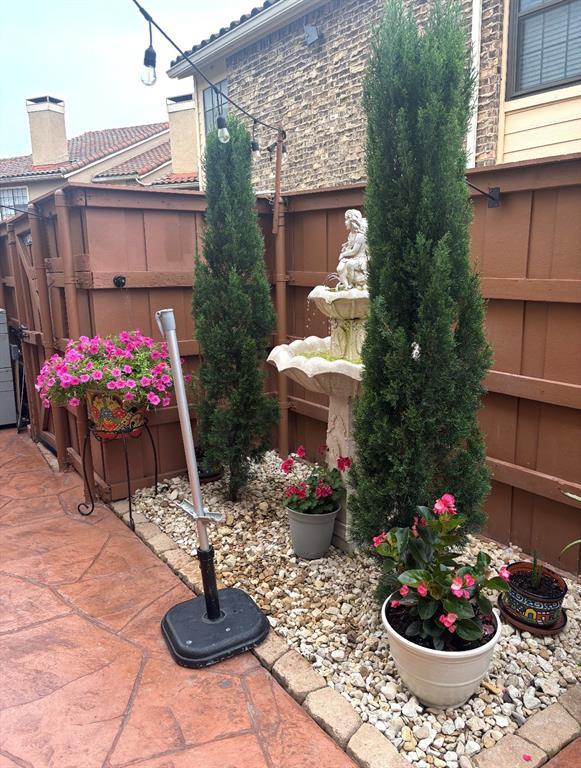 4272 Madera Road, Unit 4 Irving, TX 75038 - Photo 30 of 32 a front view of house with outdoor seating