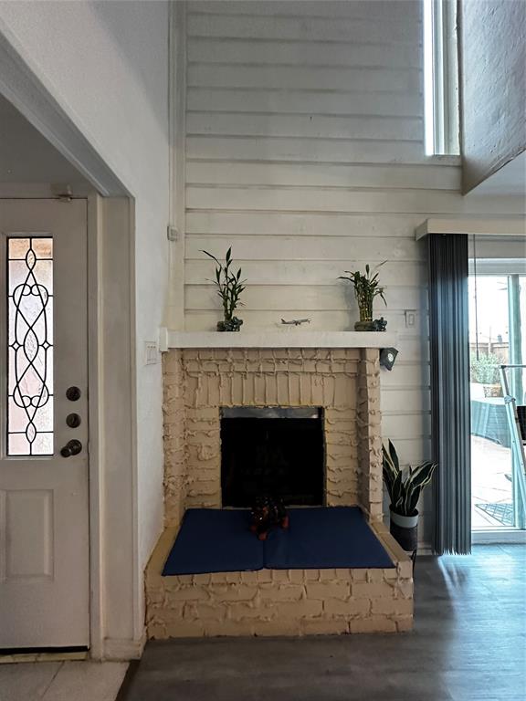 4272 Madera Road, Unit 4 Irving, TX 75038 - Photo 5 of 32 a living room with furniture and a fireplace