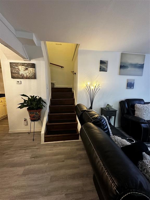 4272 Madera Road, Unit 4 Irving, TX 75038 - Photo 7 of 32 a view of entryway and hall with wooden floor