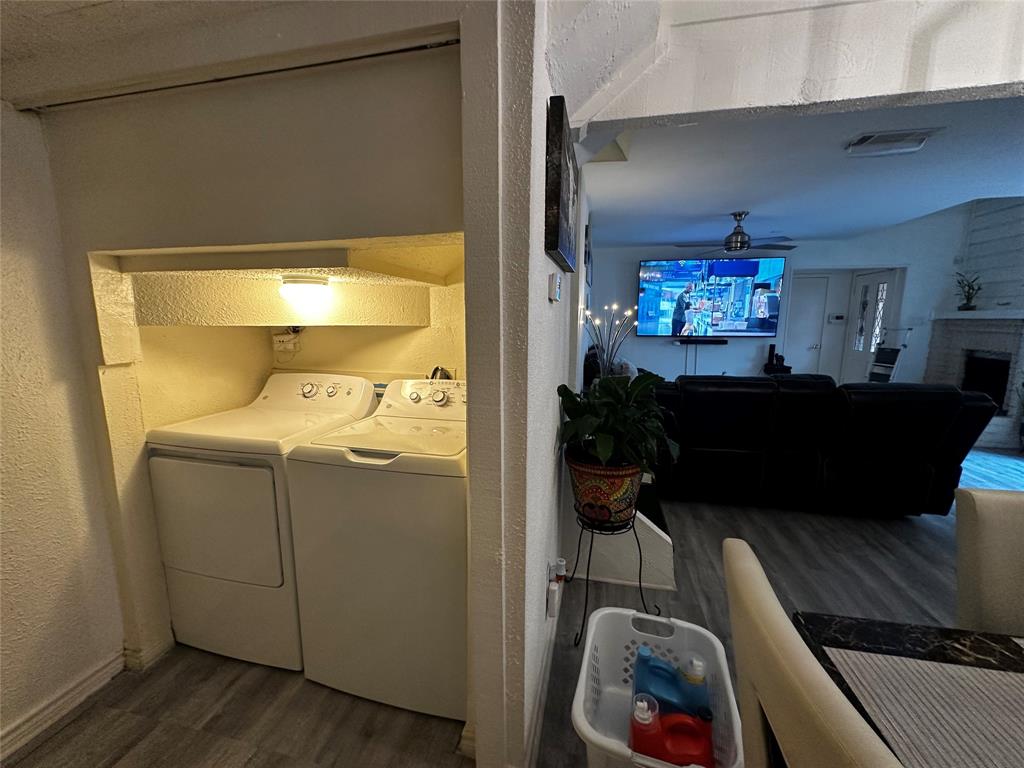 4272 Madera Road, Unit 4 Irving, TX 75038 - Photo 8 of 32 a view of a livingroom with washer and dryer