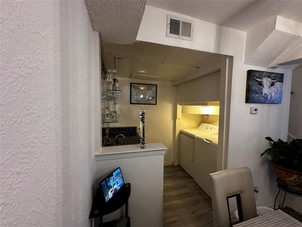 4272 Madera Road, Unit 4 Irving, TX 75038 - Photo 9 of 32 a living room with furniture and a flat screen tv